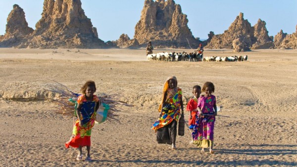 Local Afar children with their sheep, Lac Abbe (Lake Abhe Bad) with its chimneys, Republic of Djibouti, Africa